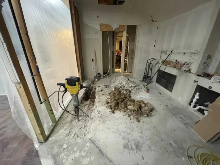 Whole-home plumbing repair project with exposed floor piping